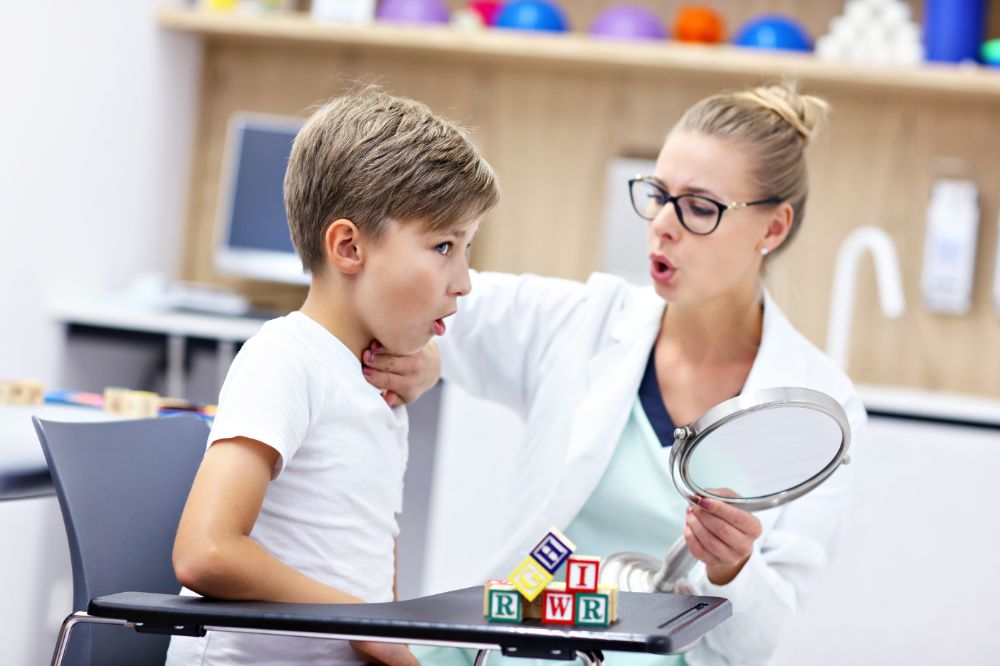 woman doing why questions speech therapy with a child